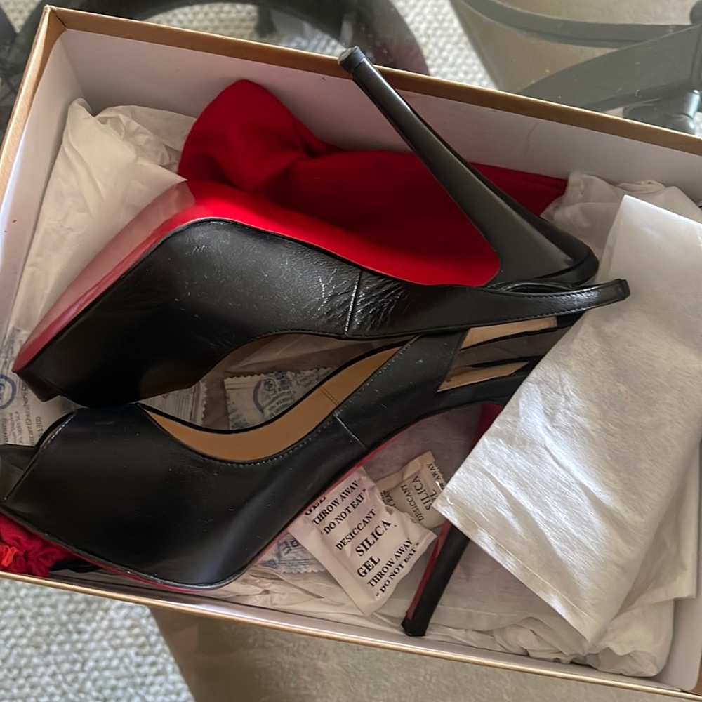 Wore these two times and touched up the bottom. Authentic from Neiman Marcus.